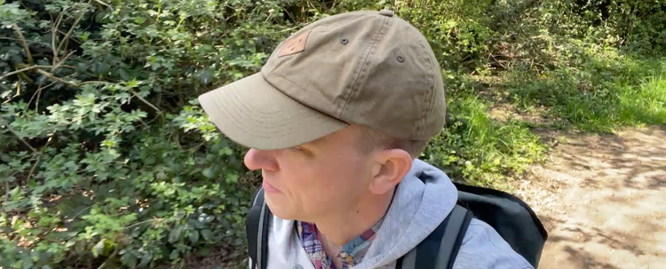 Phil walking in the woods