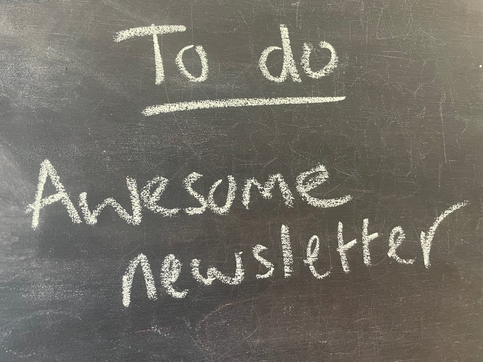 Chalk writing saying "to do awesome newsletter"